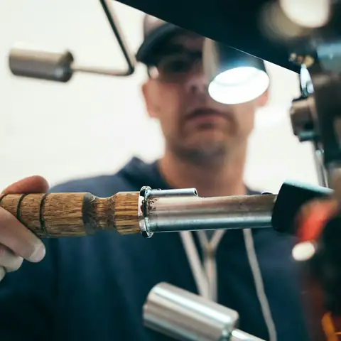 A worker using a power tool